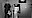 VIO 3n electrosurgical workingstation positioned in an operating room, with a blurred medical professional walking by in the background.